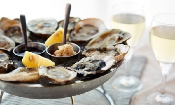 One-Dozen Oysters with Drinks at Flaherty's (47% Off) 