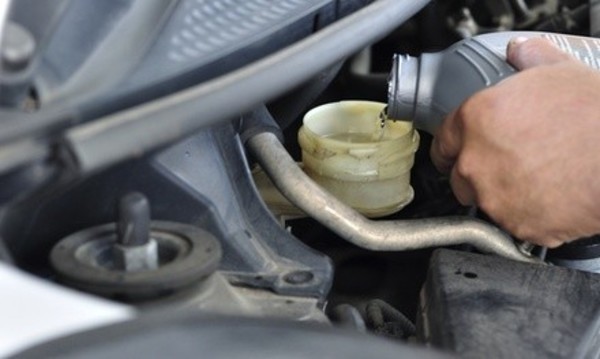Conventional, Semi-Synthetic, or Full-Synthetic Oil Change at Midas (Up to 49% Off)