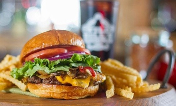 Food and Drink at Wild Bill's Sports Saloon (Up to 52% Off). 12 Options Available.