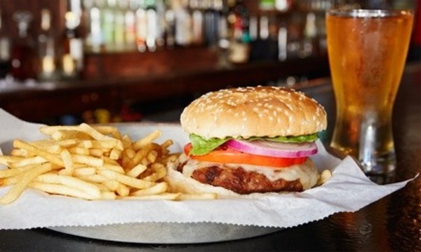 Two vouchers, Each Good for Food and Drinks for Two or Four at Joy's Bonker Hill (38% Off) 