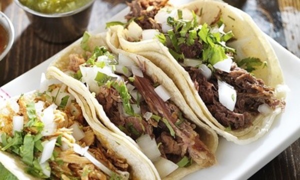 $18 for Two vouchers, Each Good for $15 Worth of Mexican Cuisine at Mi Cancun ($30 Value) 