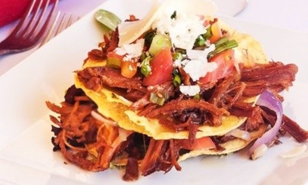 Caribbean Food at Tata's Restaurant for Two, Four, or More (46% Off)