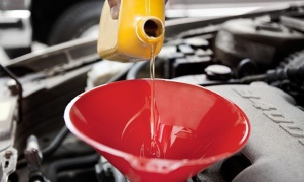 Premium Oil Change Packages or Air Induction Fuel System Cleaning at Precision Auto Care (Up to 78% Off)