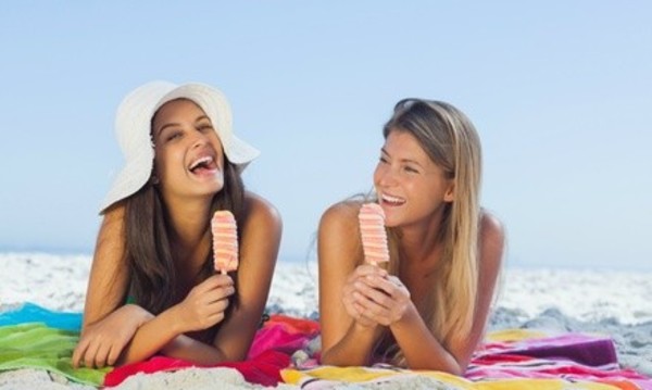UV and Spray Tanning at E-Z Tan (Up to 85% Off). Two Options Available.