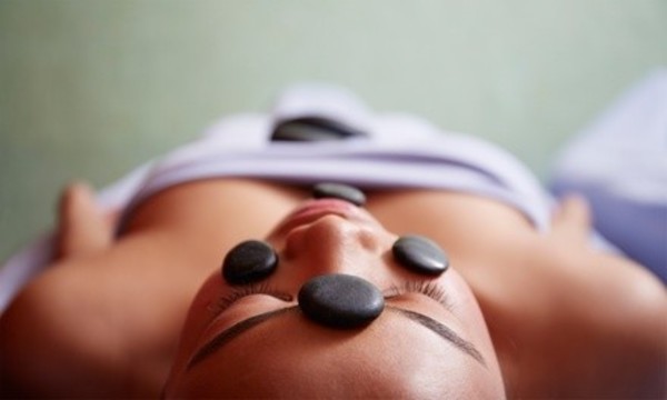 60-Minute Swedish or Hot-Stone Massage for Individual or Couple at Exel Spa (54% Off)