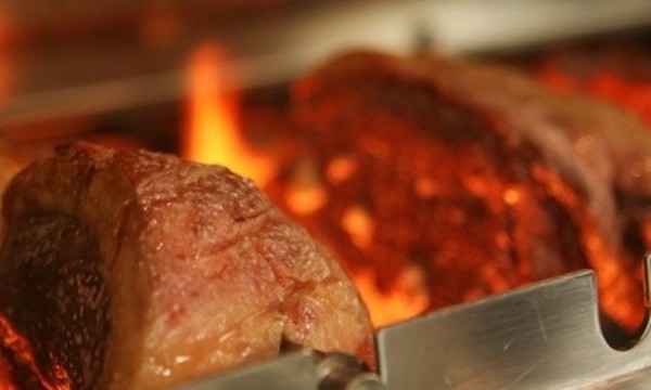 $28 for $50 Worth of Brazilian Grill Fare at Em Chamas Brazilian Grill  