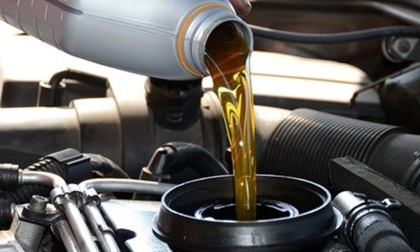 Oil Change with Inspection and Tire Rotation or Three Oil Changes at AutoTech Squad (Up to 54% Off)