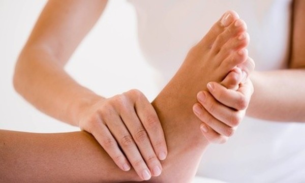 One 60- or 75-Minute Reflexology Session with Optional Foot Scrub at Fostering Forward Massage (Up to 51% Off)