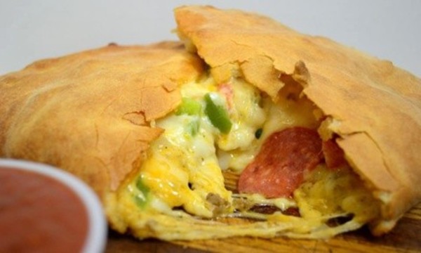 Calzones, Wings, Tots and Breadsticks at D.P. Dough (38% Off) 