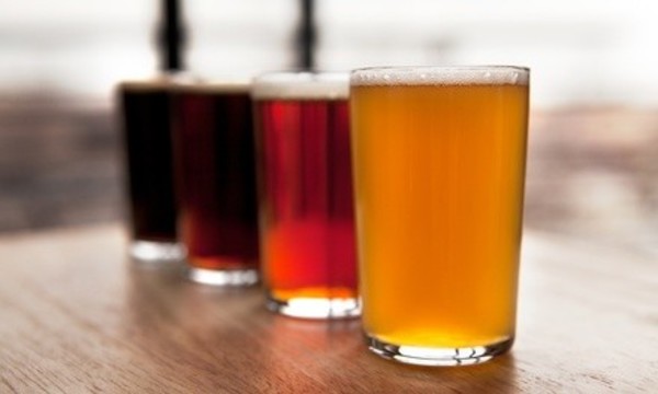 Craft Beer Tasting Flights for Two or Four at Local Brewing Company Tap Tavern & Kitchen (Up to 49% Off) 