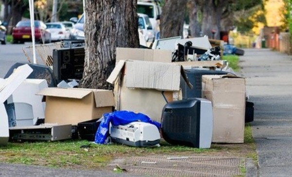 Two or Three Cubic Yards of Junk Removal by Cosmic Clean Out & Hauling (Up to 56% Off)