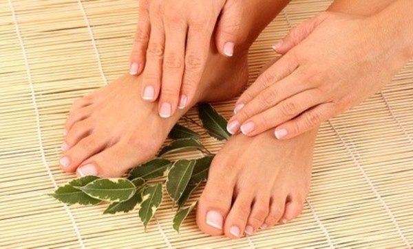 One or Two Mani-Pedis, UV Gel Nails, or Acrylics at Aqua Salon and Day Spa (Up to 55% Off)