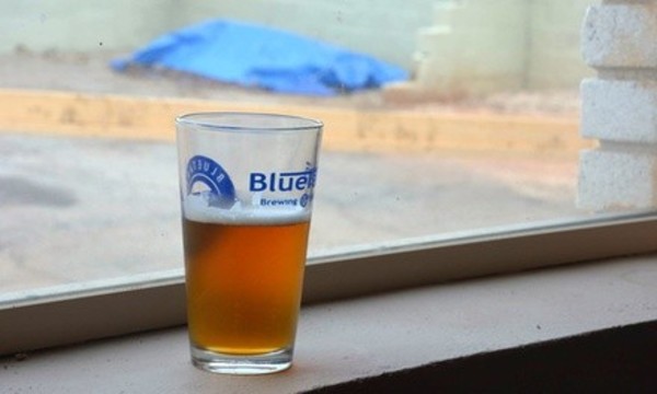 Souvenir Package with Pint Glasses, Samples, and T-Shirts for 2 or 4 at BlueTarp Brewing Co. (Up to 42% Off) 