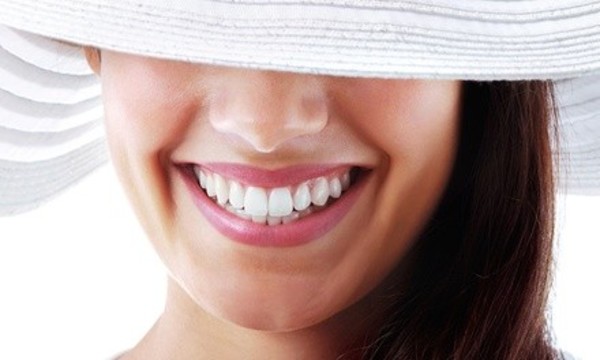 Teeth Whitening, Exam, X-Rays, and Cosmetic Cleaning for One or Two at Richard Johnson DDS (40% Off)