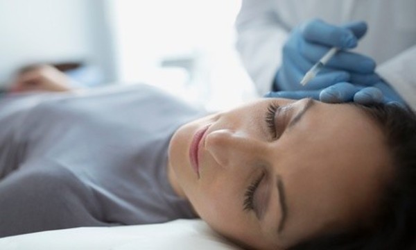 20 Units of Botox Plus Dental Exam at Center for Cosmetic, Implant & Neuromuscular Dentistry (Up to 65% Off)     