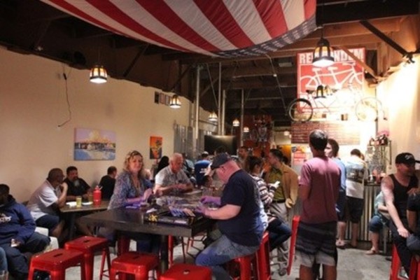 One or Two Flights of Four Beer Tasters, and Growler Bottle from Red Tandem Brewery (Up to 40% Off)