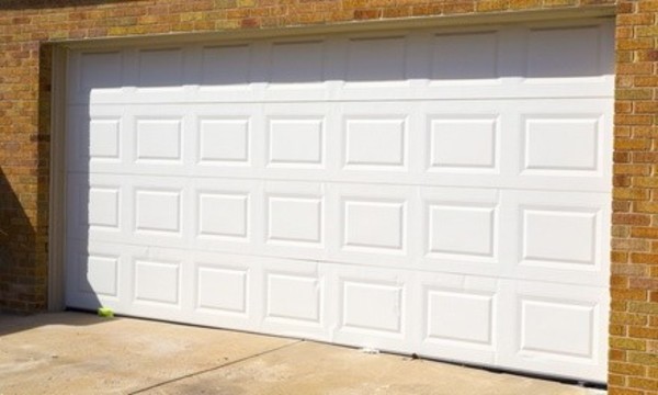 Garage Door Tune-Up for Door With or Without Roller Replacement at Family Prestige Garage Doors (Up to 63% Off)