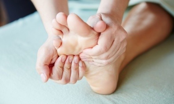 60-Minute Foot Reflexology Session at Happy Feet Spa (35% Off). Two Locations Available. 