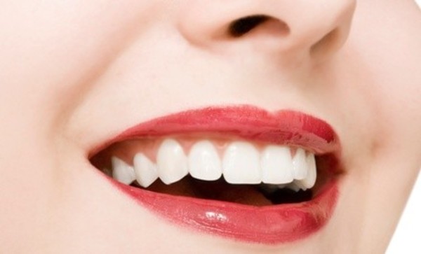 One or Two BleachBright Teeth-Whitening Treatments at Glo Tanning (Up to 58% Off)