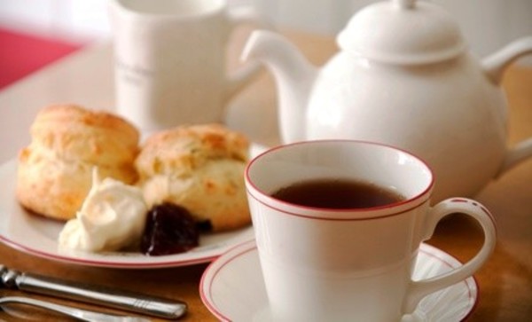 High Tea with Sandwiches, Scones, and Dessert for Two or Four at Auntie Rae's Dessert Island (39% Off)