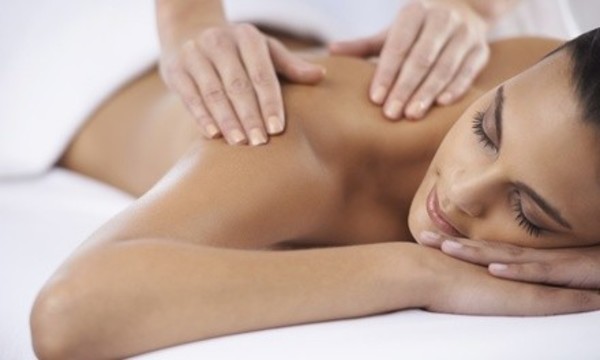 Up to 80% Off Massage and Chiropractic Package at Healing Waves Wellness Center