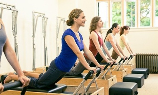 4 or 10 Small-Group Reformer Classes at Vitality Pilates Studio (Up to 76% Off)