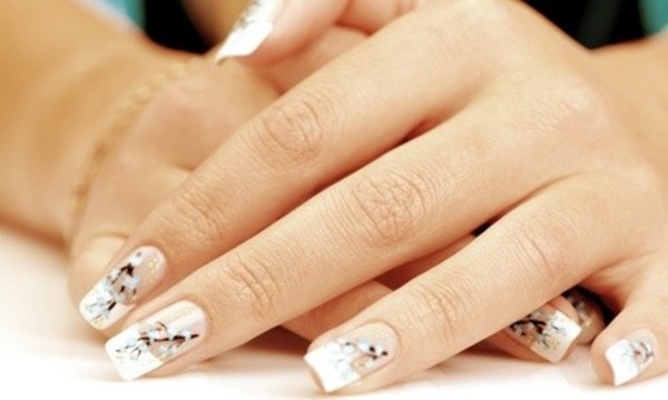 $27 for a Deluxe Manicure and Deluxe Pedicure at Salon Palomo & Day Spa ($70 Value)