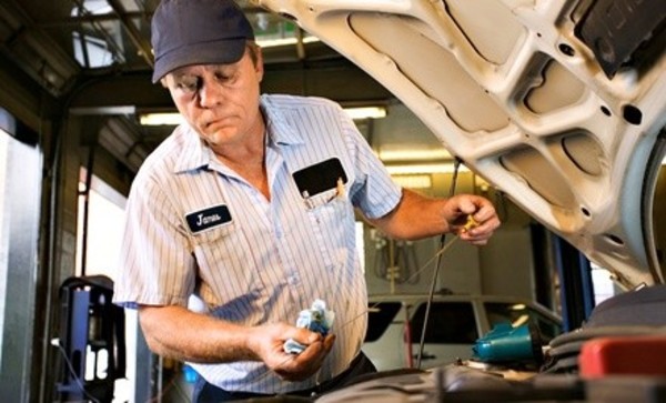 $99 for a Maintenance Package with a Coolant Flush and Oil Change at AAMCO ($264.28 Value)