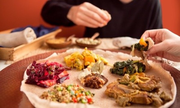 Ethiopian Meal for Two or Four with Appetizers, Entrees, and Dessert at Axum Restaurant (Up to 45% Off)