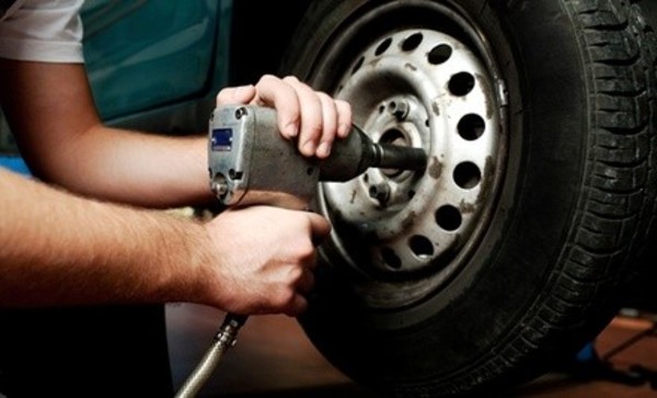 Wheel Alignment with Optional 12-Month Warranty at Mac's Auto Care (Up to 52% Off)