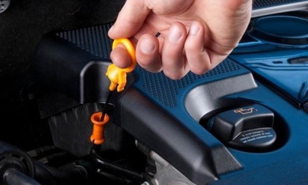 Synthetic Blend or Full Synthetic Oil Change at J & M Discount Tire and Auto (Up to 52% Off) 