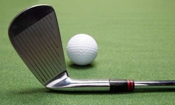 Golf-Practice Package for One or Two with Range Balls and Drinks at Golfer's Paradise (Up to 53% Off)