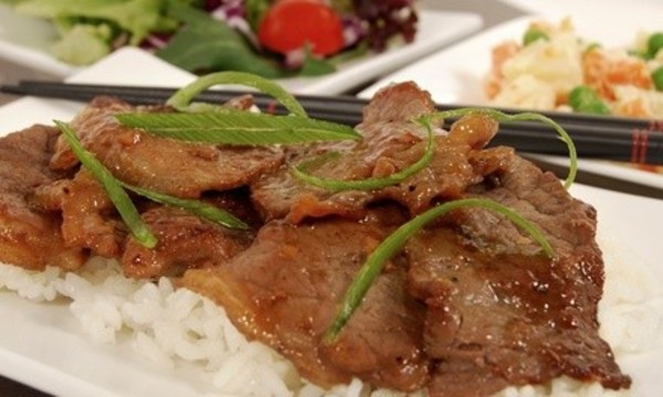 $12 for Two vouchers, Each Good for $10 Worth of Dinner for Two at Lee’s Mongolian Grill ($20 Value)