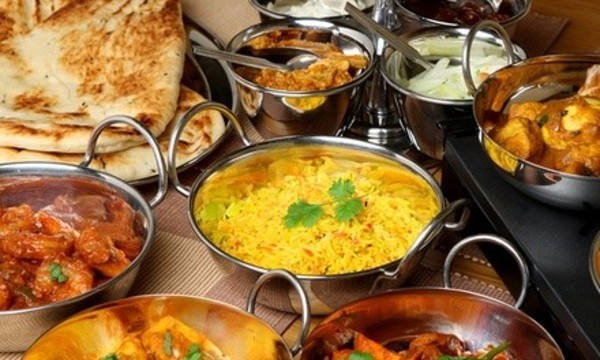 Indian Cuisine at Taj Indian Restaurant (Up to 40% Off). Two Options Available.