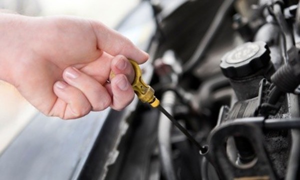 One or Three Oil Changes, Tire Rotations, and 31-Point Inspections at Charlie's Automotive, LLC (Up to 52% Off)