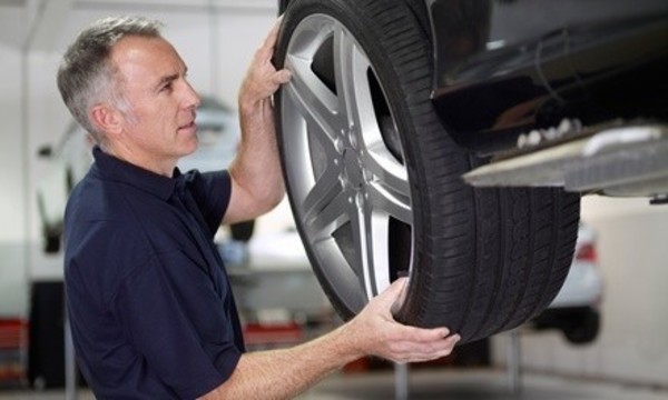 $49 for Four-Wheel Alignment, driving test, and balance check at J & M Discount Tire & Auto ($99 Value)