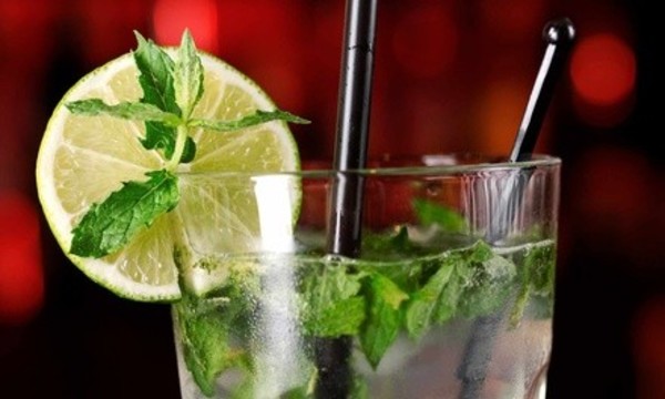 Pitchers and Well Drinks for Two or Four at Martin’s Bar (48% Off)