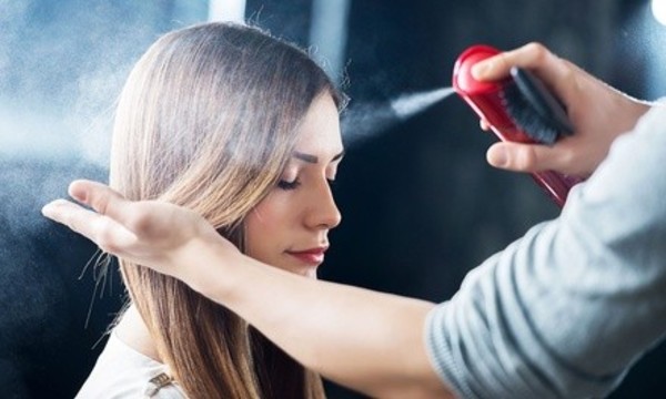 Haircut, Wash, and Blow-Dry with Optional Color or Highlights at 50th Avenue Salon (Up to 67% Off)