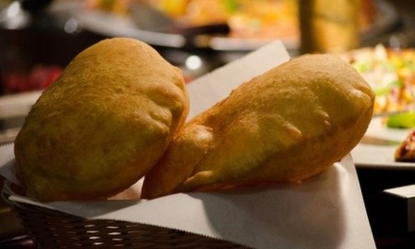 Indian-Italian Fusion Fare for Dine-In or Takeout at Curry & Crust Indian Cuisine & Desi Pizza (Up to 44% Off)