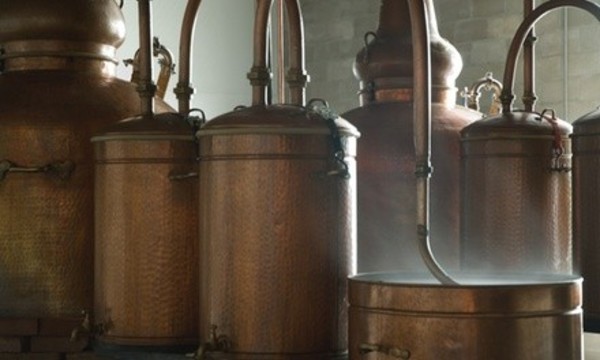 Distillery Tour and Etched Glencairn Whiskey Glasses for Two or Four at New England Distilling (38% Off)