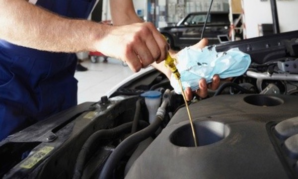 $59 for a One-Year Maintenance Package with Four Oil Changes at Honest-1 Auto Care ($245 Value)