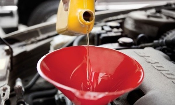 Semi-Synthetic or Synthetic Oil Change at Craig's Auto Repair (Up to 42% Off). Four Options Available.