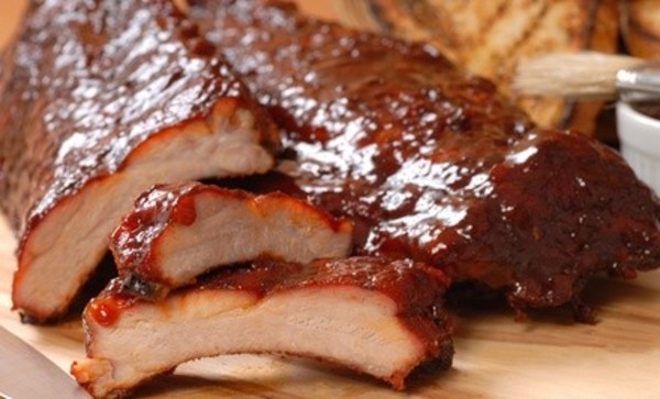 Dinner at Pig Pit BBQ (Up to 53% Off)