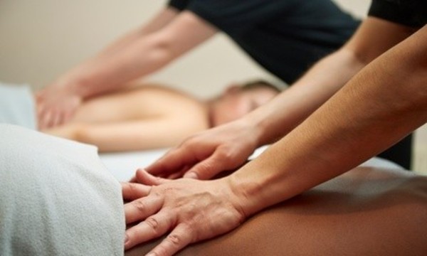 $103 for 60-Minute Couples' Bodywork Massage with Hot Stones at Rainbow Health Center ($180 Value)