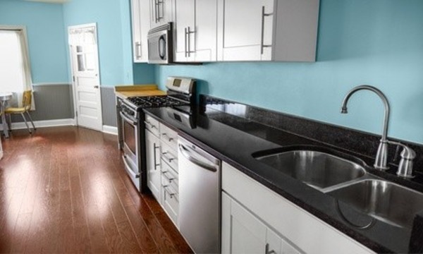 Two, Three, or Four Man Hours of House Cleaning from First House Cleaning (Up to 56% Off)