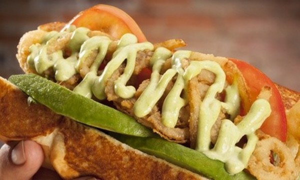 Sausages, Hot Dogs, and Burgers for Two or Four at Dog Haus (Up to 38% Off)