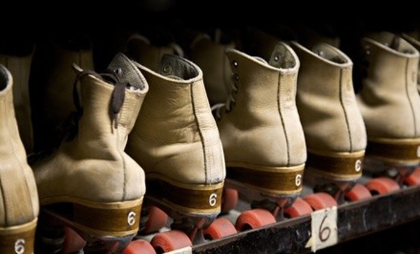 Skating Package for Two, Four with Pizza and Drinks at Roller Motion Skate Center (Up to 52% Off)