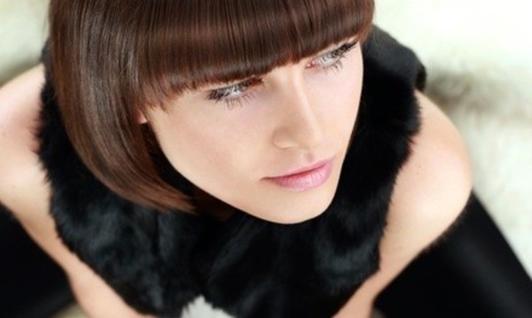 One Haircut and Brow Wax with Optional Partial Highlights at Miquela at Central Park Hair Studio (Up to 69% Off)