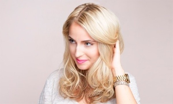$34.50 for a Haircut with Aveda Purescription Conditioning Treatment at Strands Salon and Spa ($70 Value) 