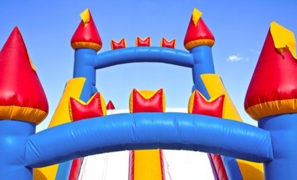 One-Day Rental of Bounce House or Castle with Slide and Optional Bubble Machine from All In Fun (Up to 54% Off)